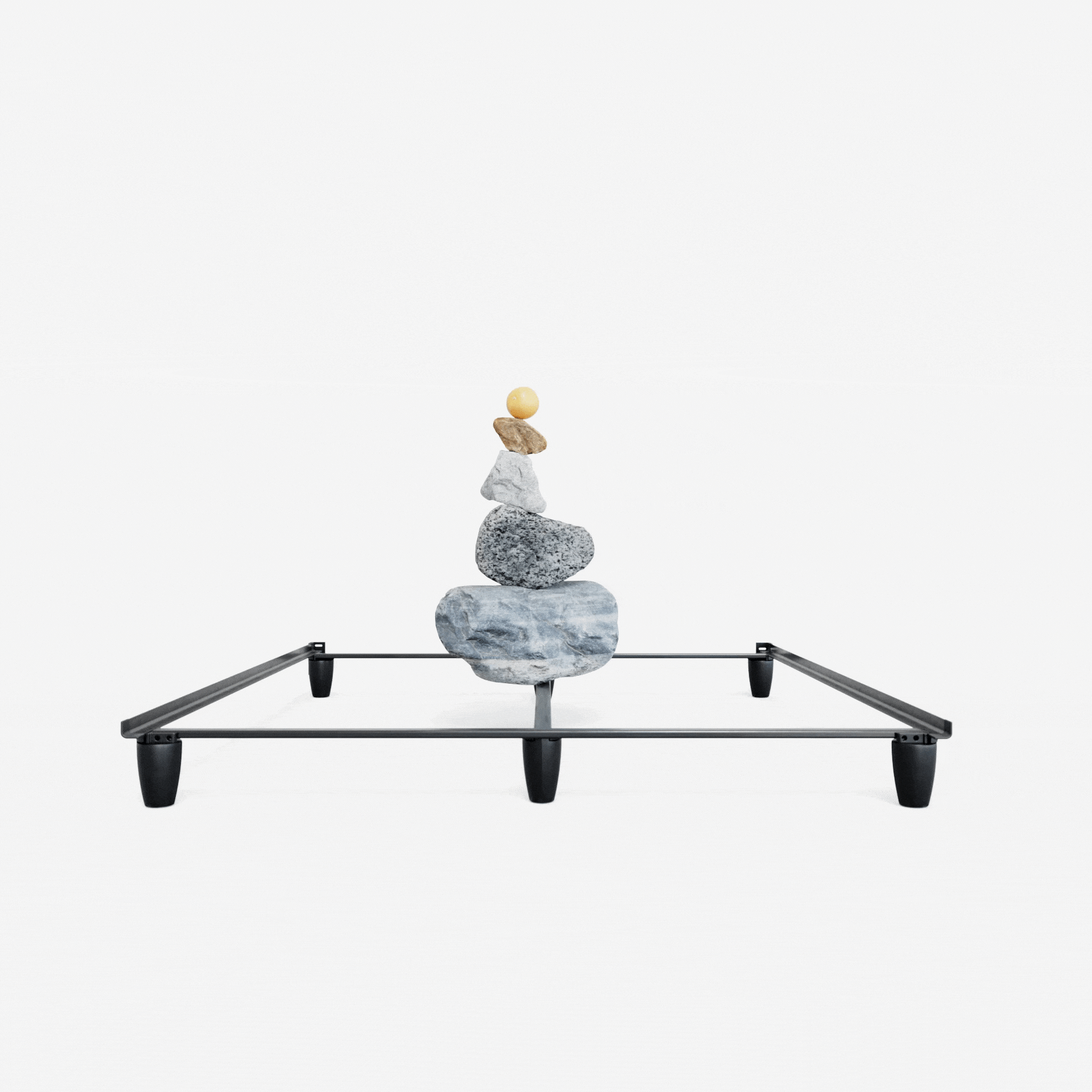 Pile of rocks balancing on a bed frame