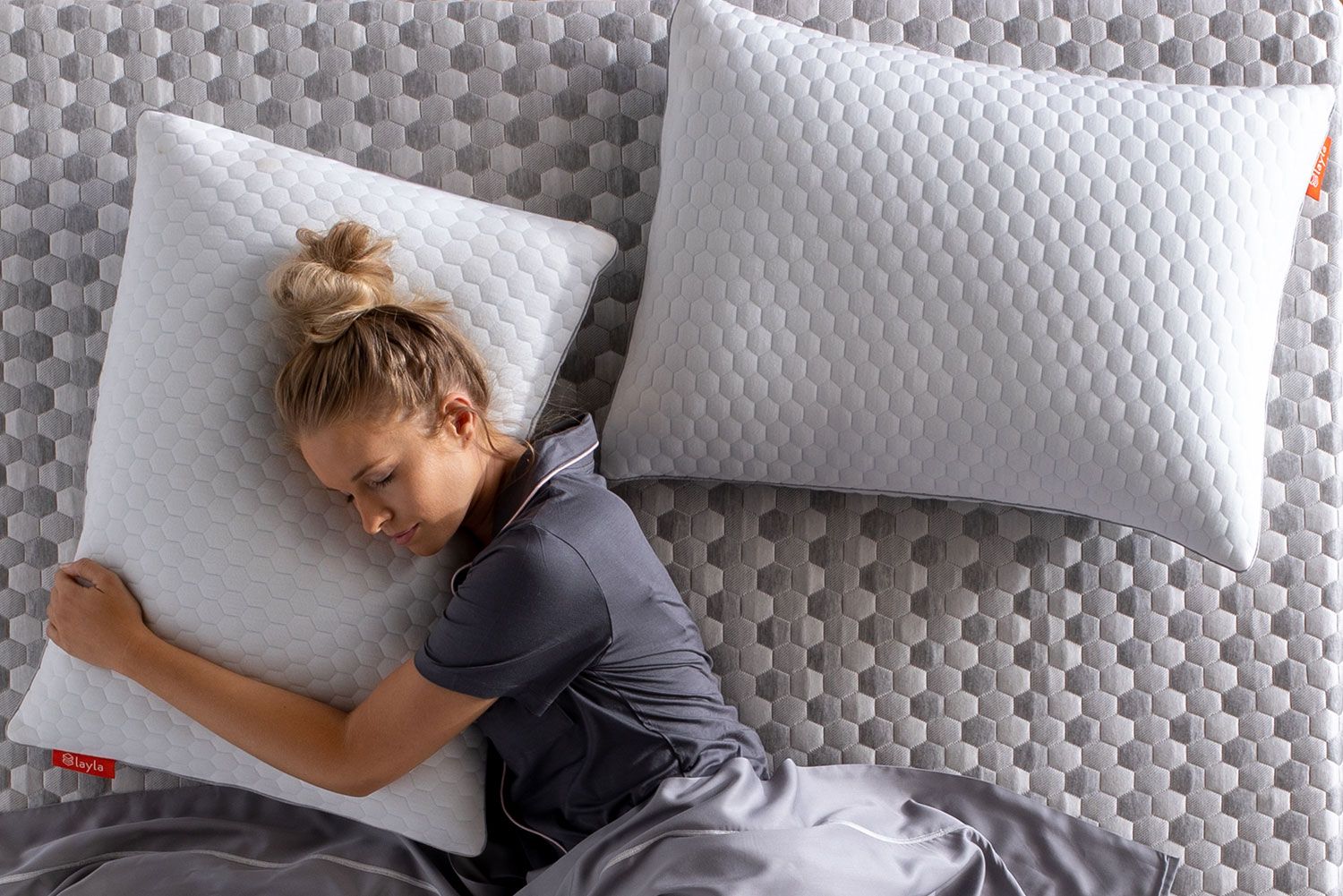 Woman laying on memory foam pillow