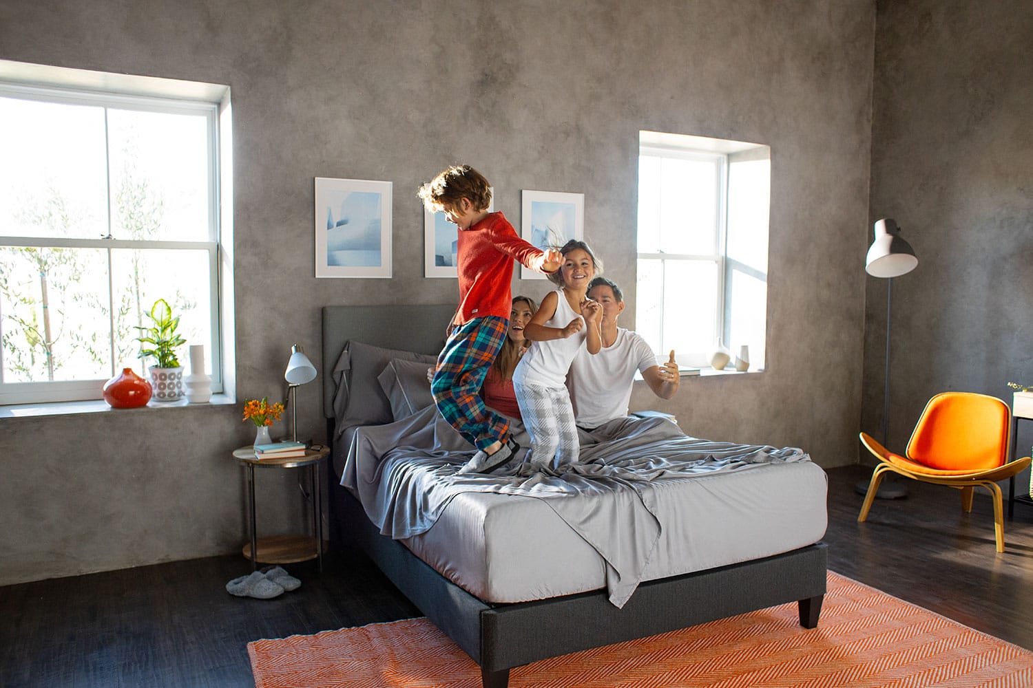 Platform Bed with mattress and a family on the bed
