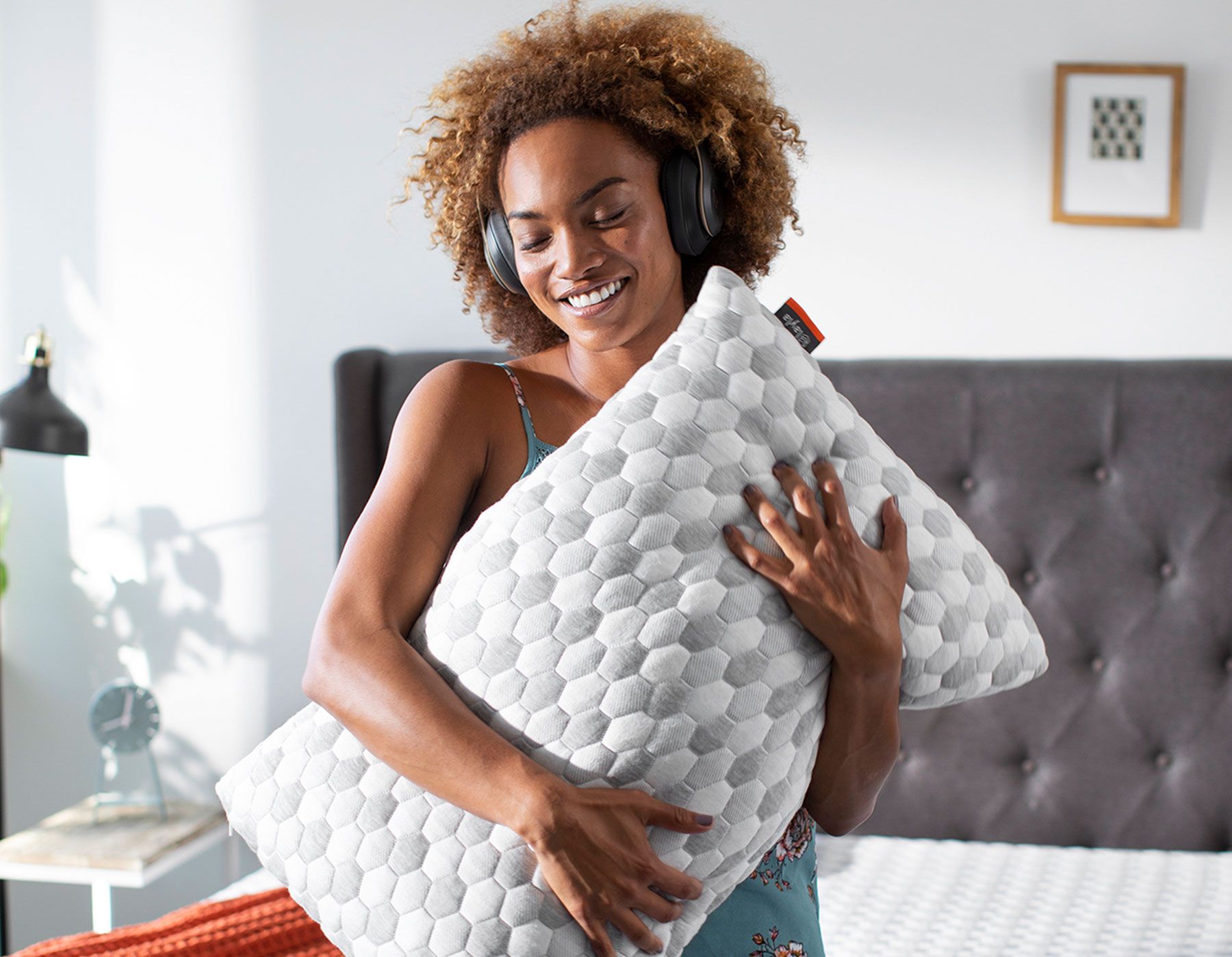 Woman Listening music holding kapok pillow