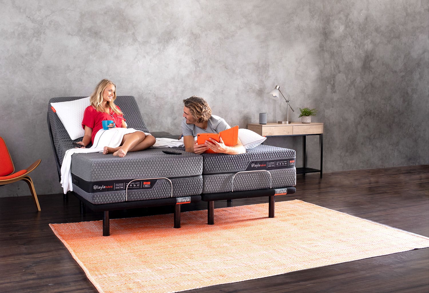 Couple on a split king adjustable base bed setup