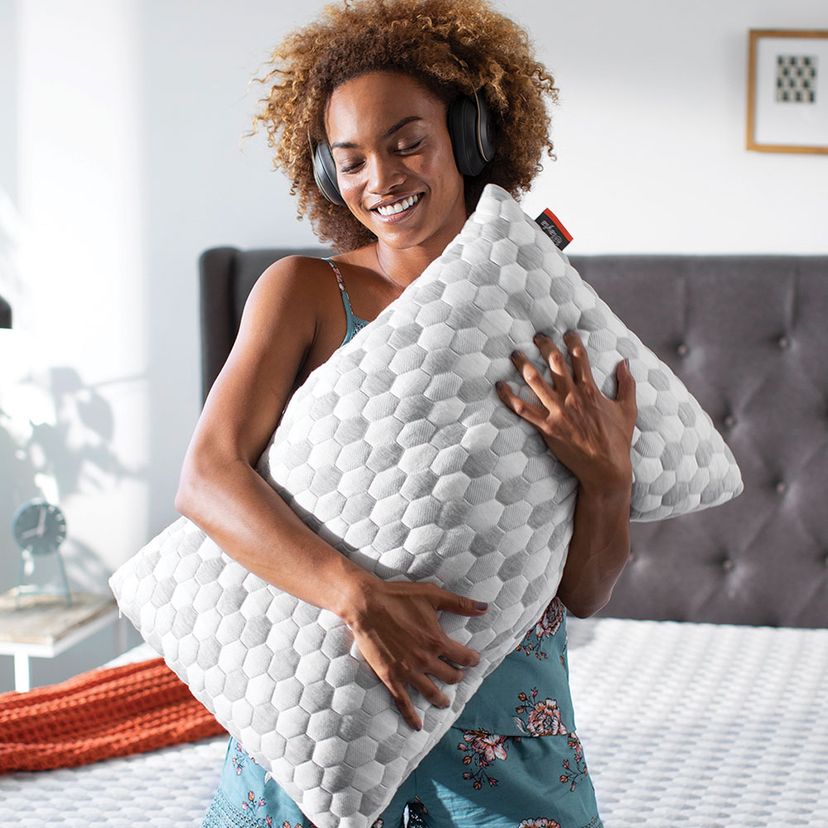 Woman Listening music holding kapok pillow